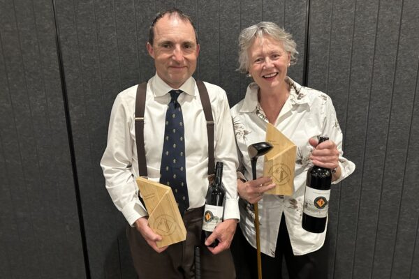 Justin Ryan and Kim Hastie with prizes